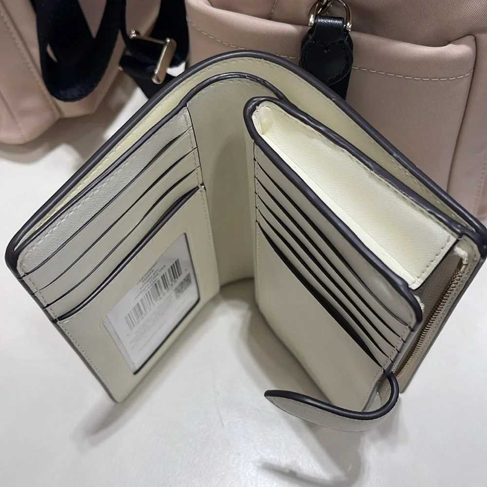 Kate Spade Schuyler Medium Compact Bifold Wallet
Meringue
NWT - Picture 10 of 16